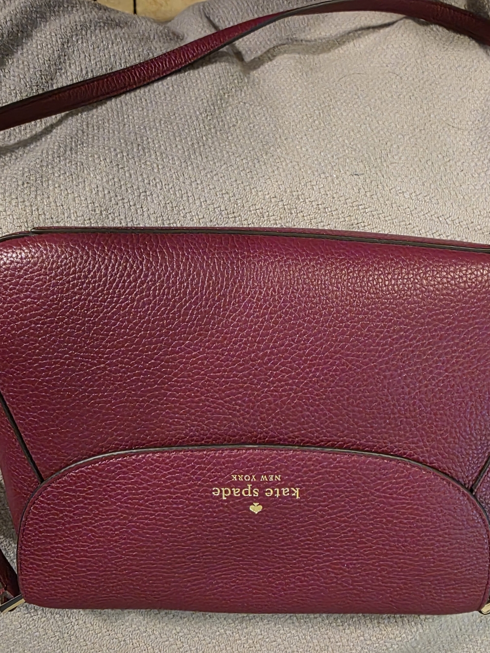 kate spade pebbled leather crossbody in deep berry